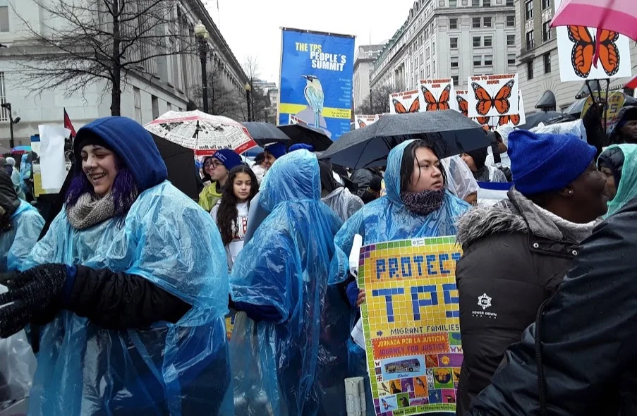 Pouring rain during TPS march from the White House to the Russel Senate Building
