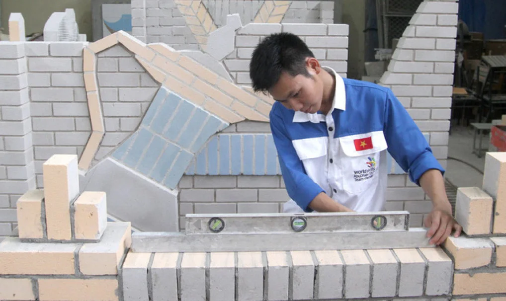 Mang nghề xây gạch ra thế giới
