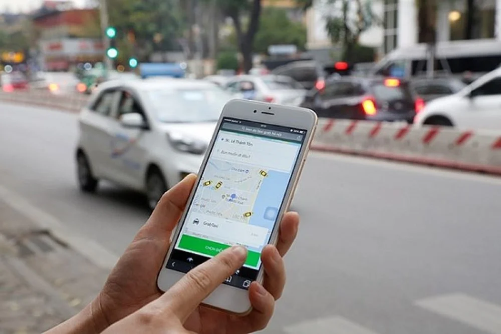 Taxi truyền thống bắt tay công nghệ: Lợi cả đôi đường