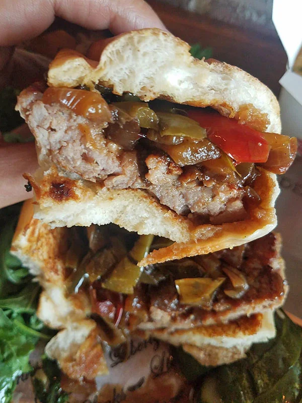 A cross section of the sweet Italian sausage sandwich