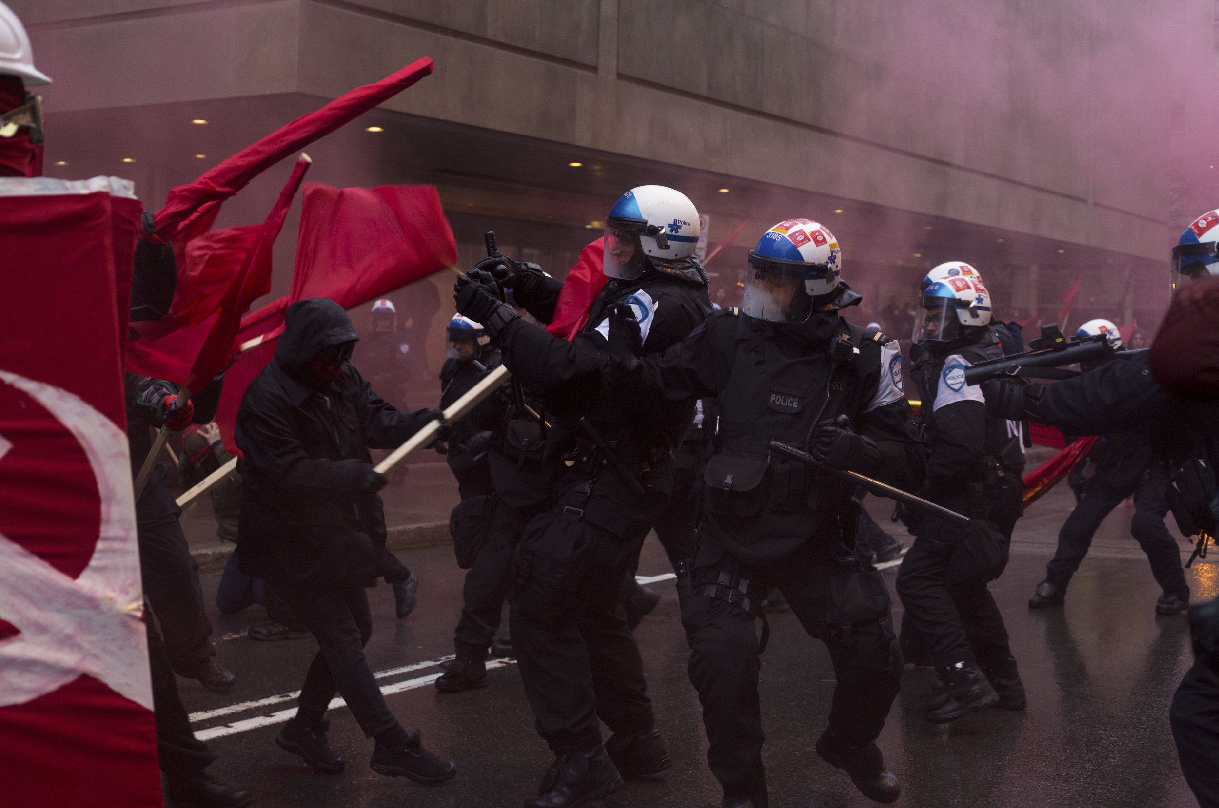  Protesters clash with riot police at an anticapitalist May Day demonstration in Montreal (May 1 2017) 
