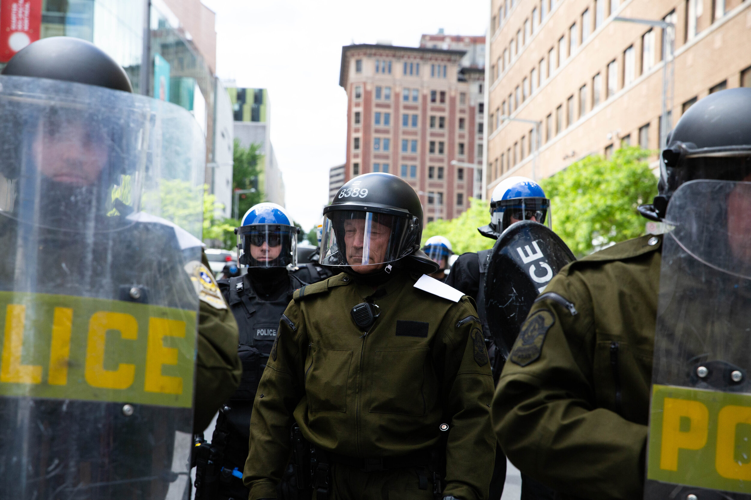  SPVM and SQ guarding police HQ in downtown Montreal during a Black Lives Matter protest in downtown Montreal [June 7 2020] 