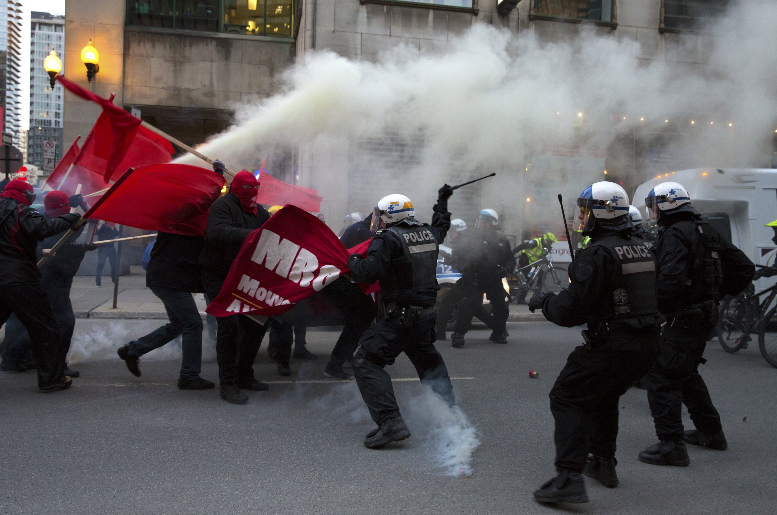  Demonstrators and SPVM fighting in the streets during May Day demonstrations. May 1 2018.  