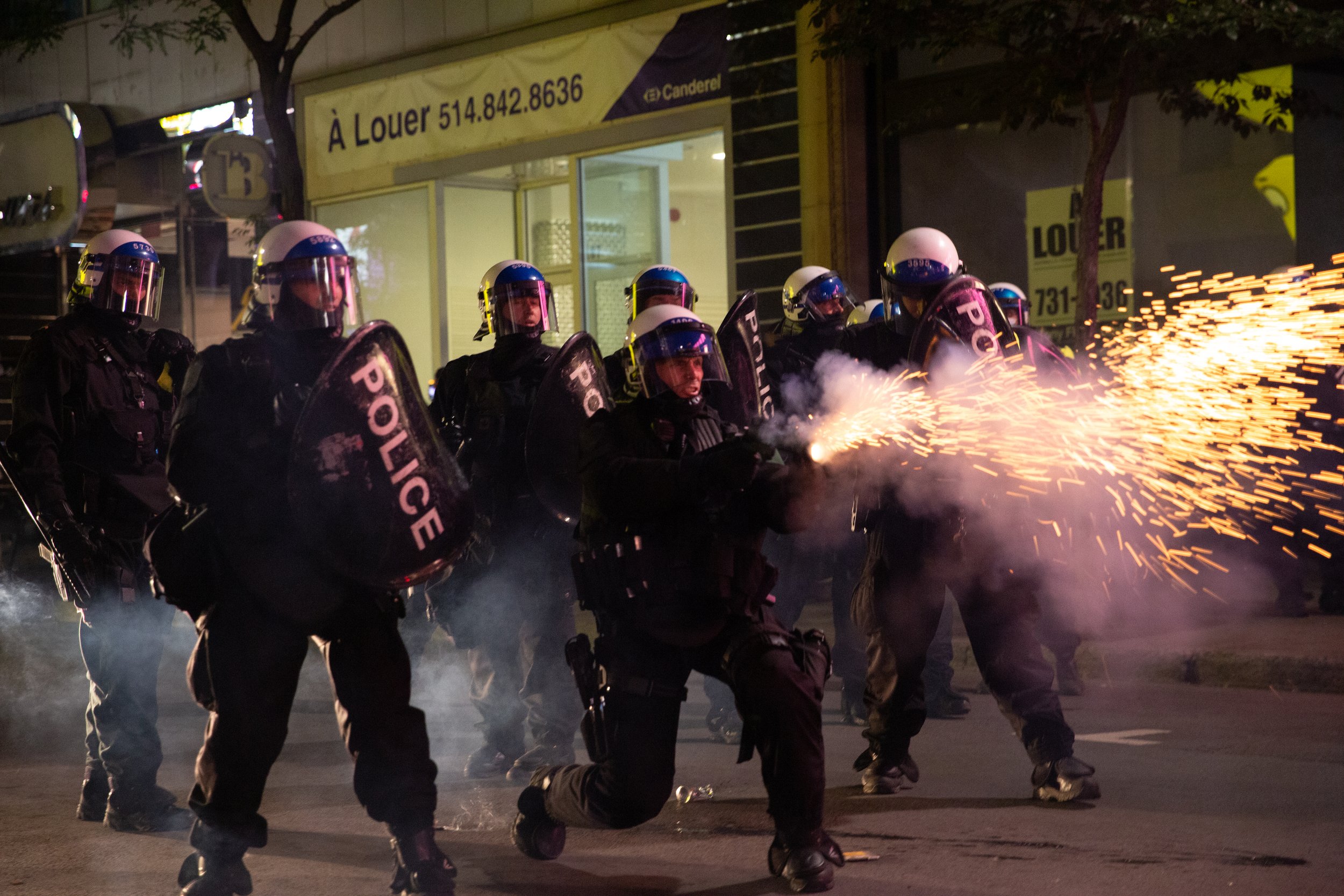  SPVM shoot tear gas at Montreal Canadiens fans following the teams playoff win against the Winnipeg Jets. June 24 2021 