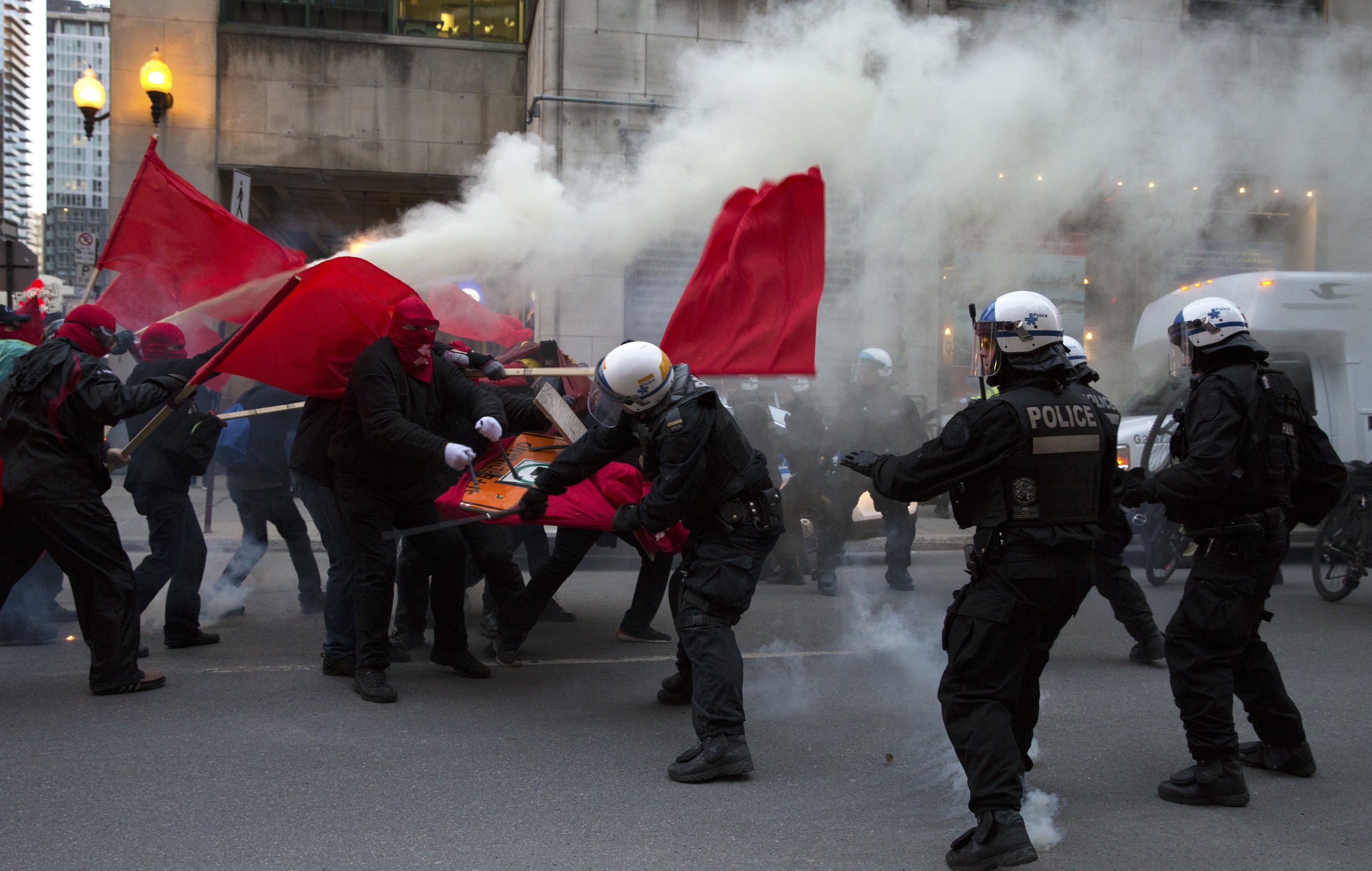  Demonstrators and SPVM fighting in the streets during May Day demonstrations. May 1 2018.  