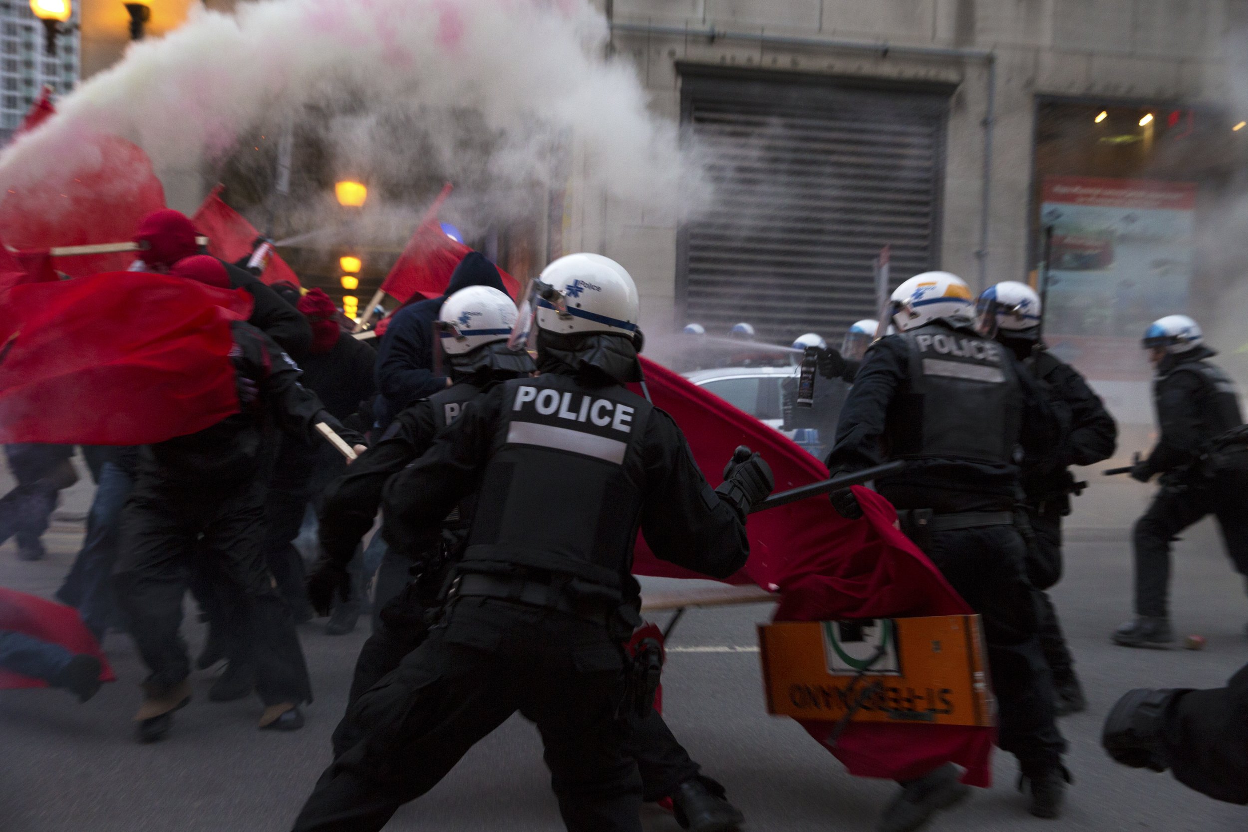  Demonstrators and SPVM fighting in the streets during May Day demonstrations. May 1 2018.  