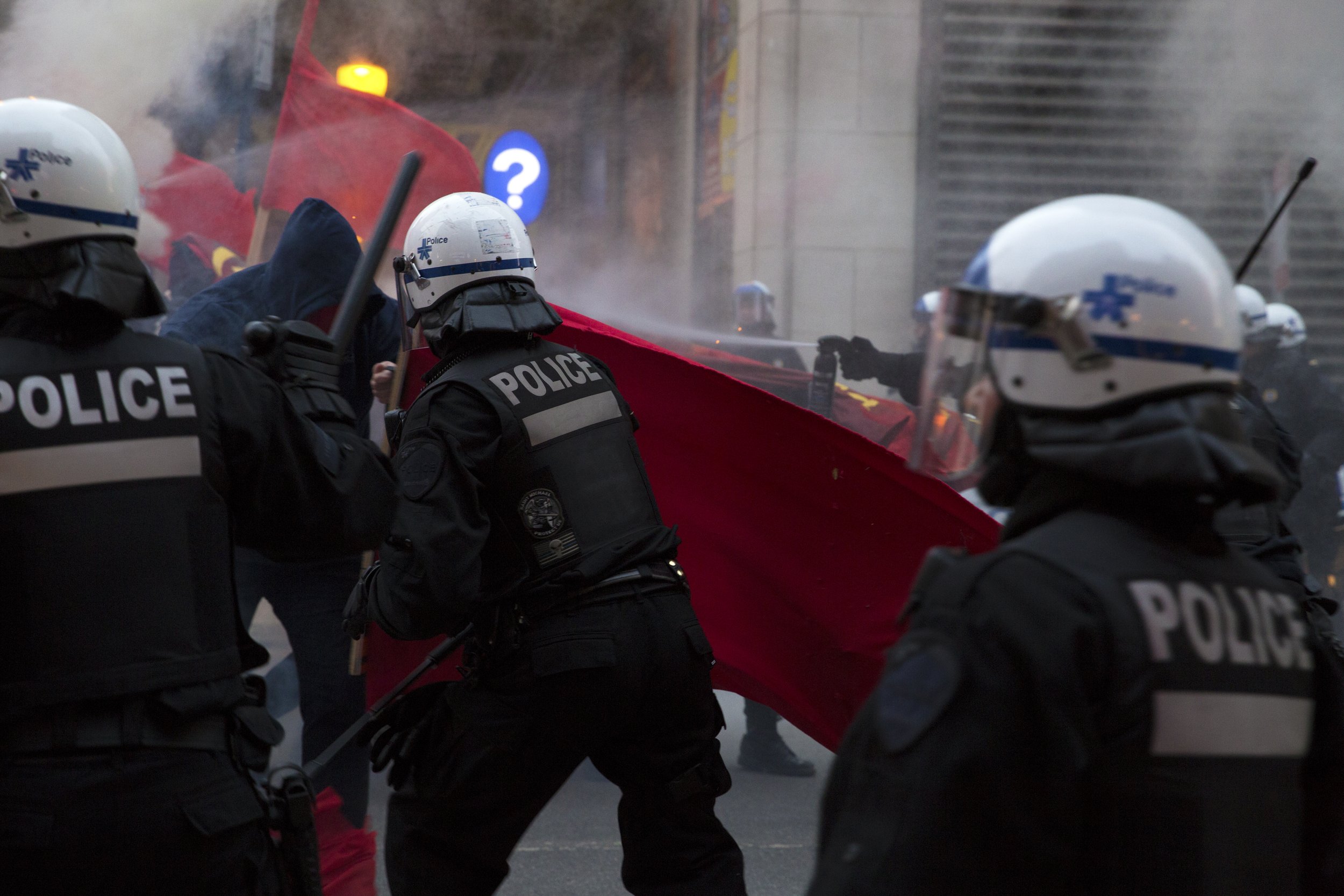  Demonstrators and SPVM fighting in the streets during May Day demonstrations. May 1 2018.  