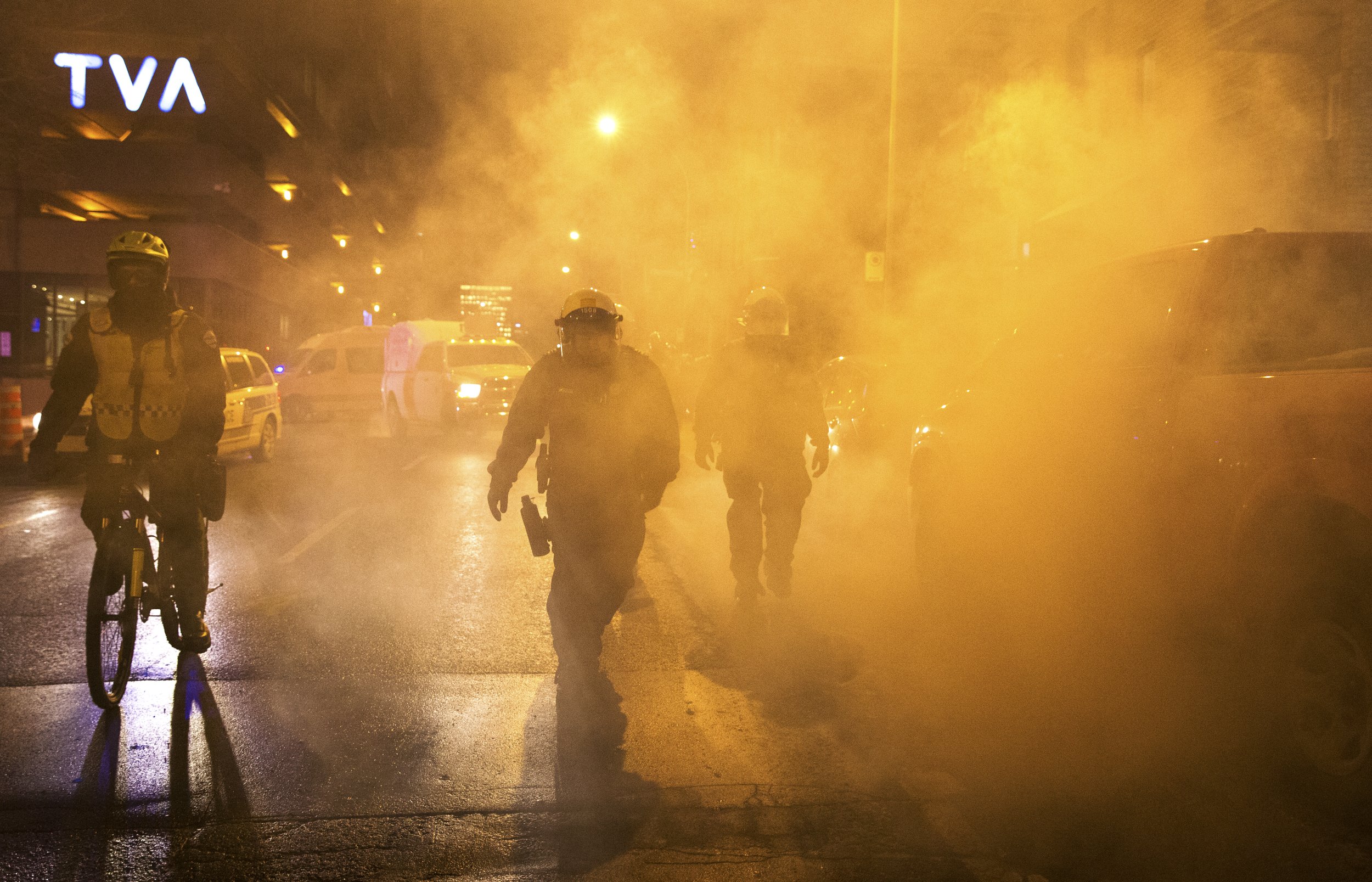  Police emerging from a smoke bomb during demonstrations against TVA. December 20 2017. 