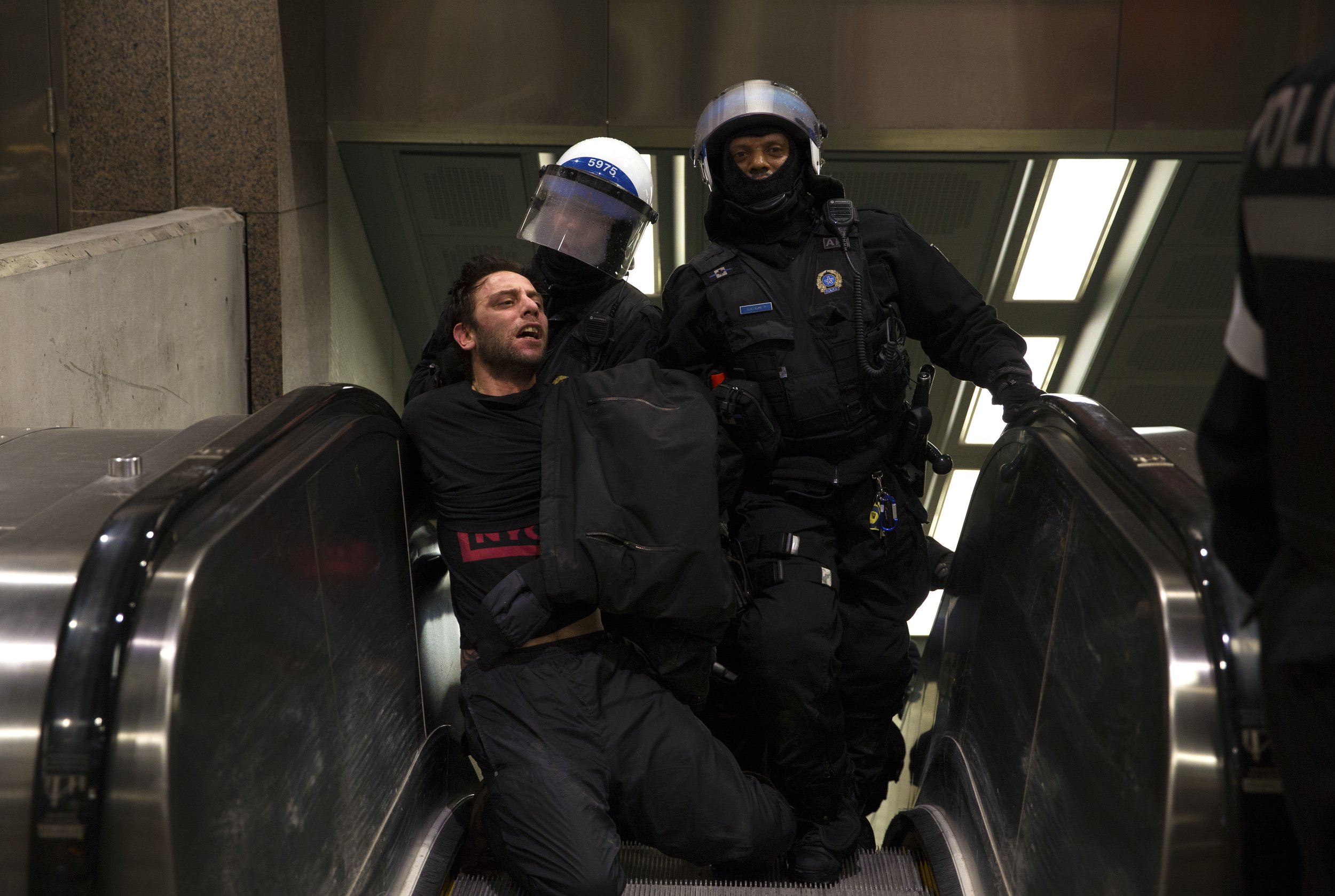  Montreal police arrest a demonstrator during a protest against the police shooting of a young indigenous man in Maniwaki, Quebec. February 1 2018.  