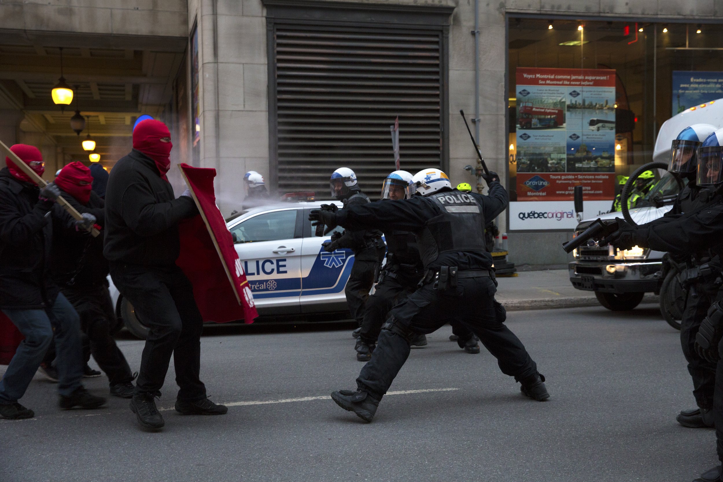  Demonstrators and SPVM fighting in the streets during May Day demonstrations. May 1 2018.  