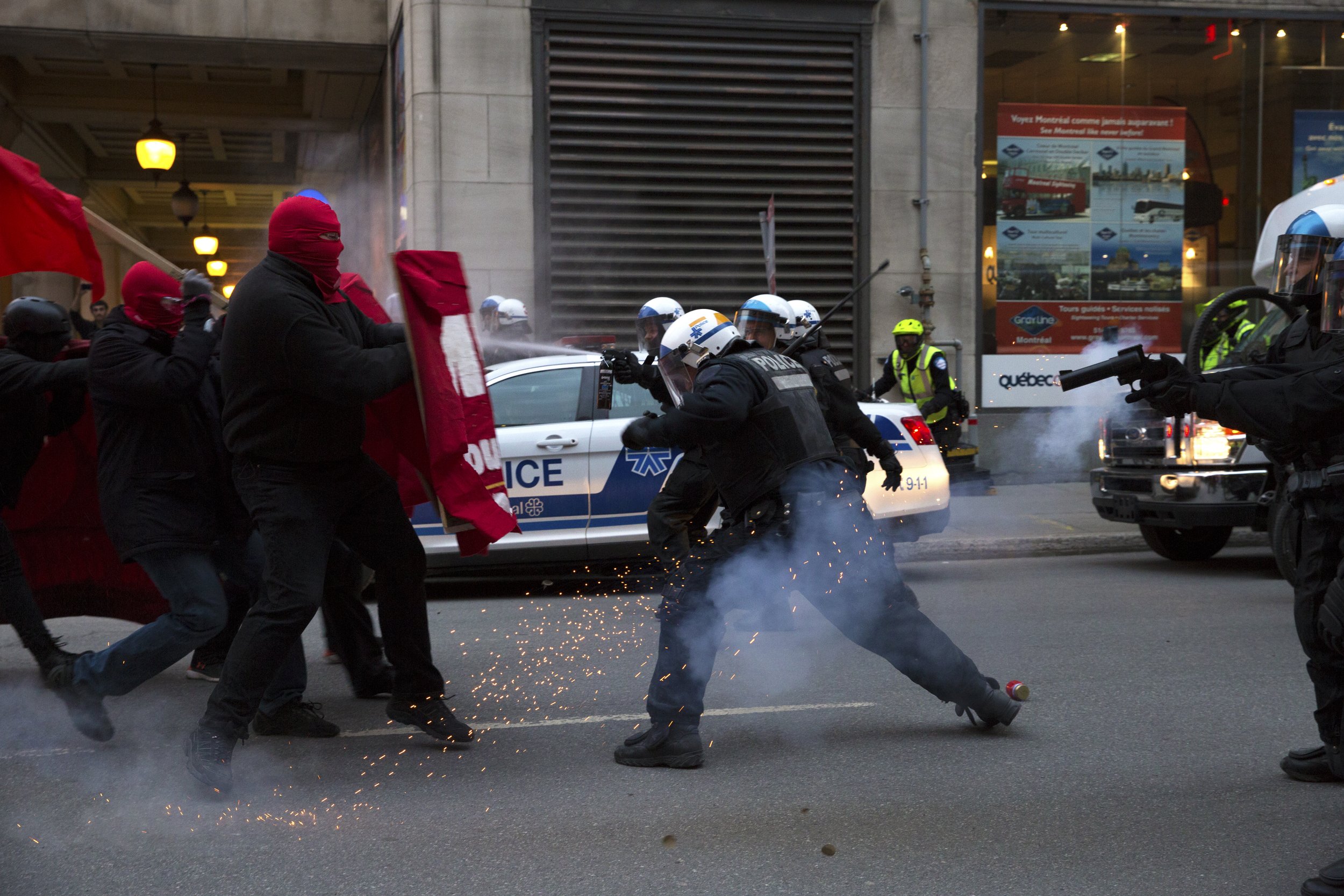  Demonstrators and SPVM fighting in the streets during May Day demonstrations. May 1 2018.  