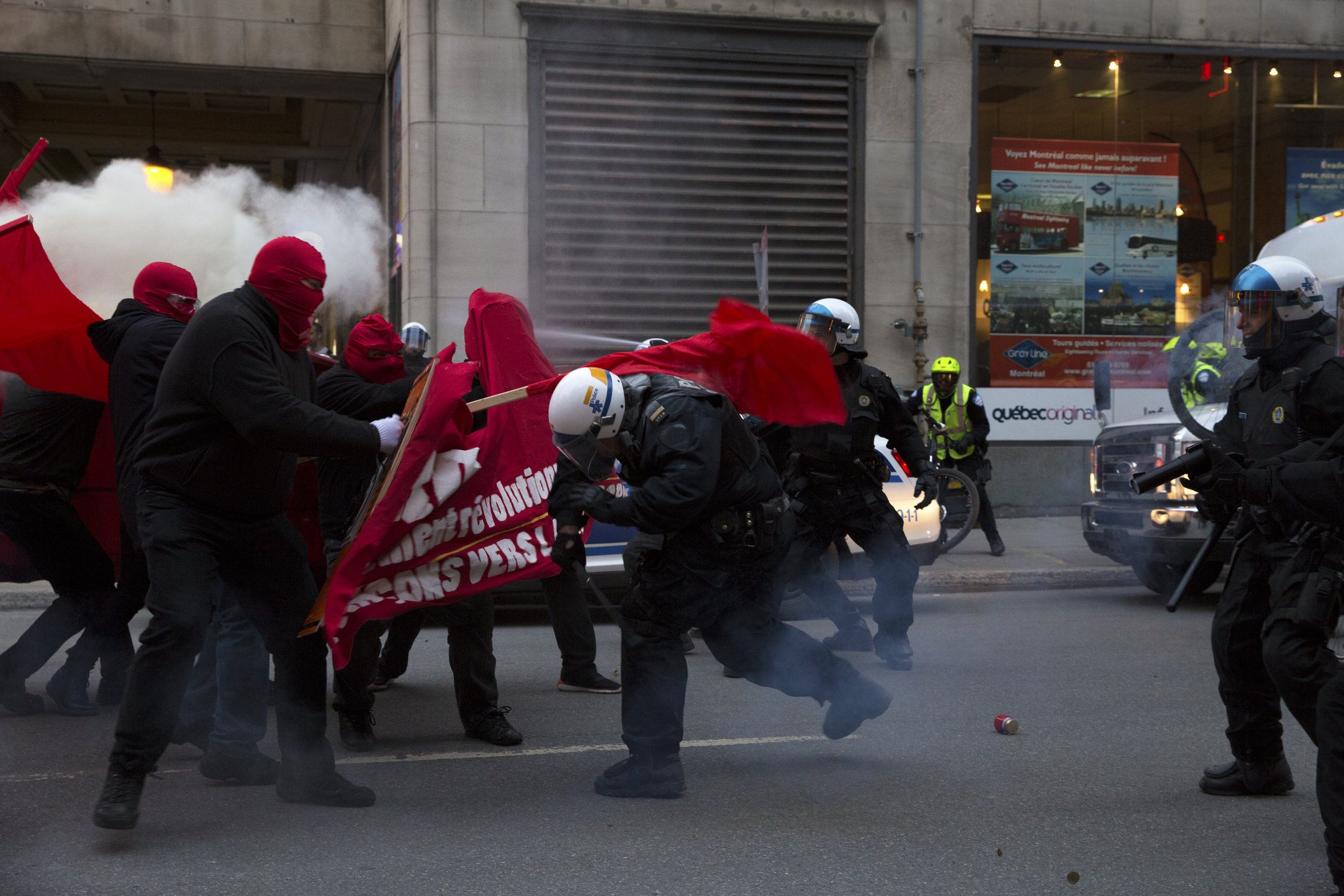  Demonstrators and SPVM fighting in the streets during May Day demonstrations. May 1 2018.  