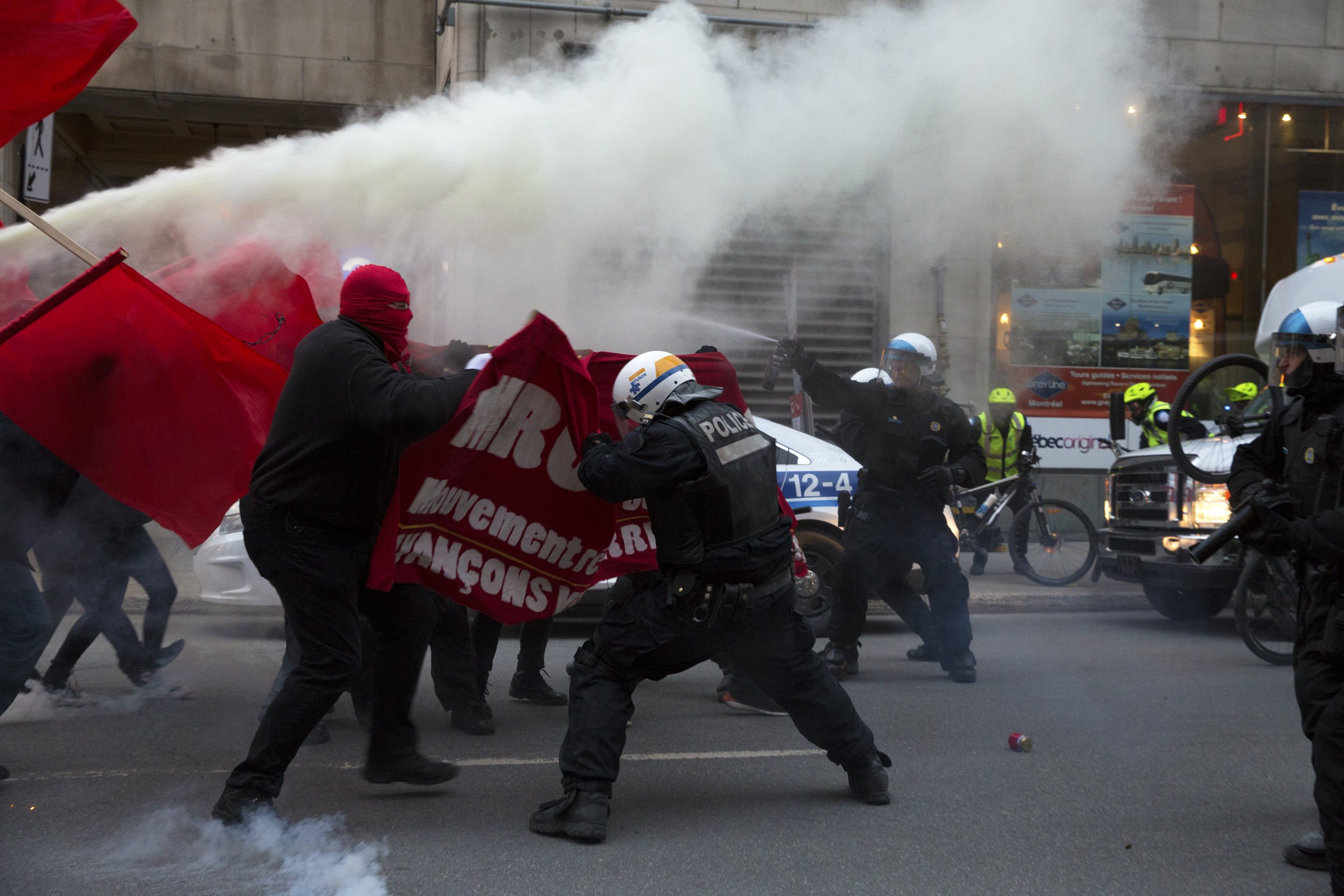  Demonstrators and SPVM fighting in the streets during May Day demonstrations. May 1 2018.  