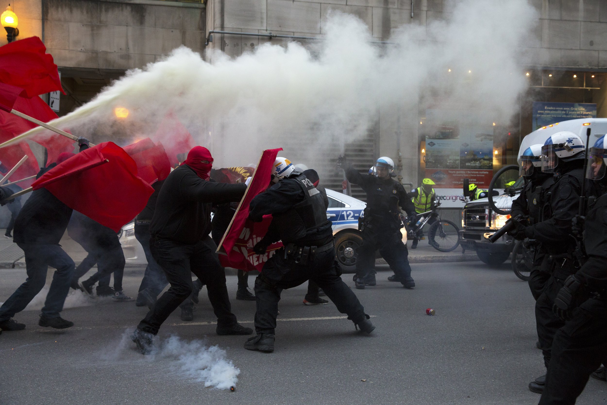  Demonstrators and SPVM fighting in the streets during May Day demonstrations. May 1 2018.  