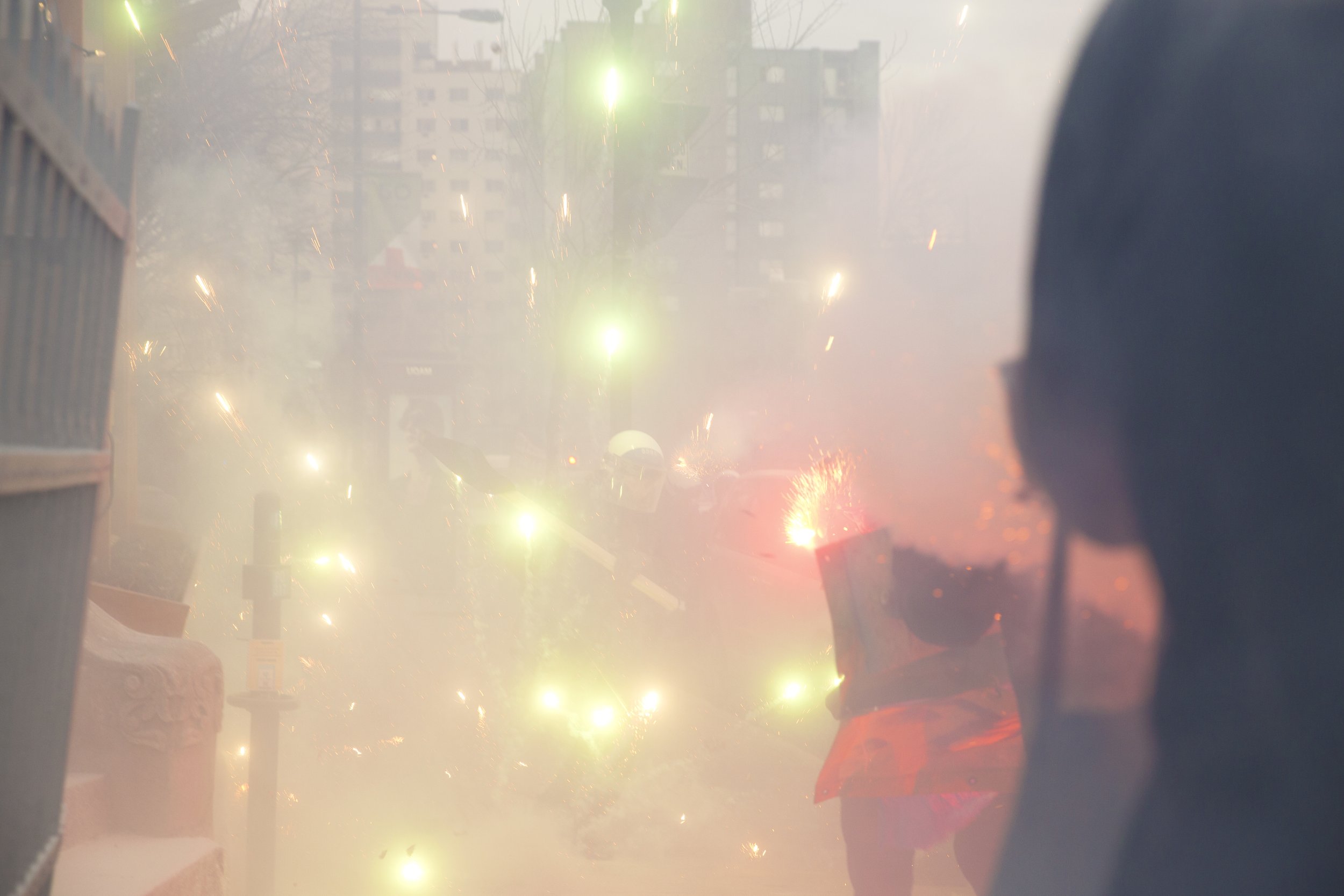  Protesters shoot fireworks at Montreal police during a May Day demonstration. May 1 2018.  