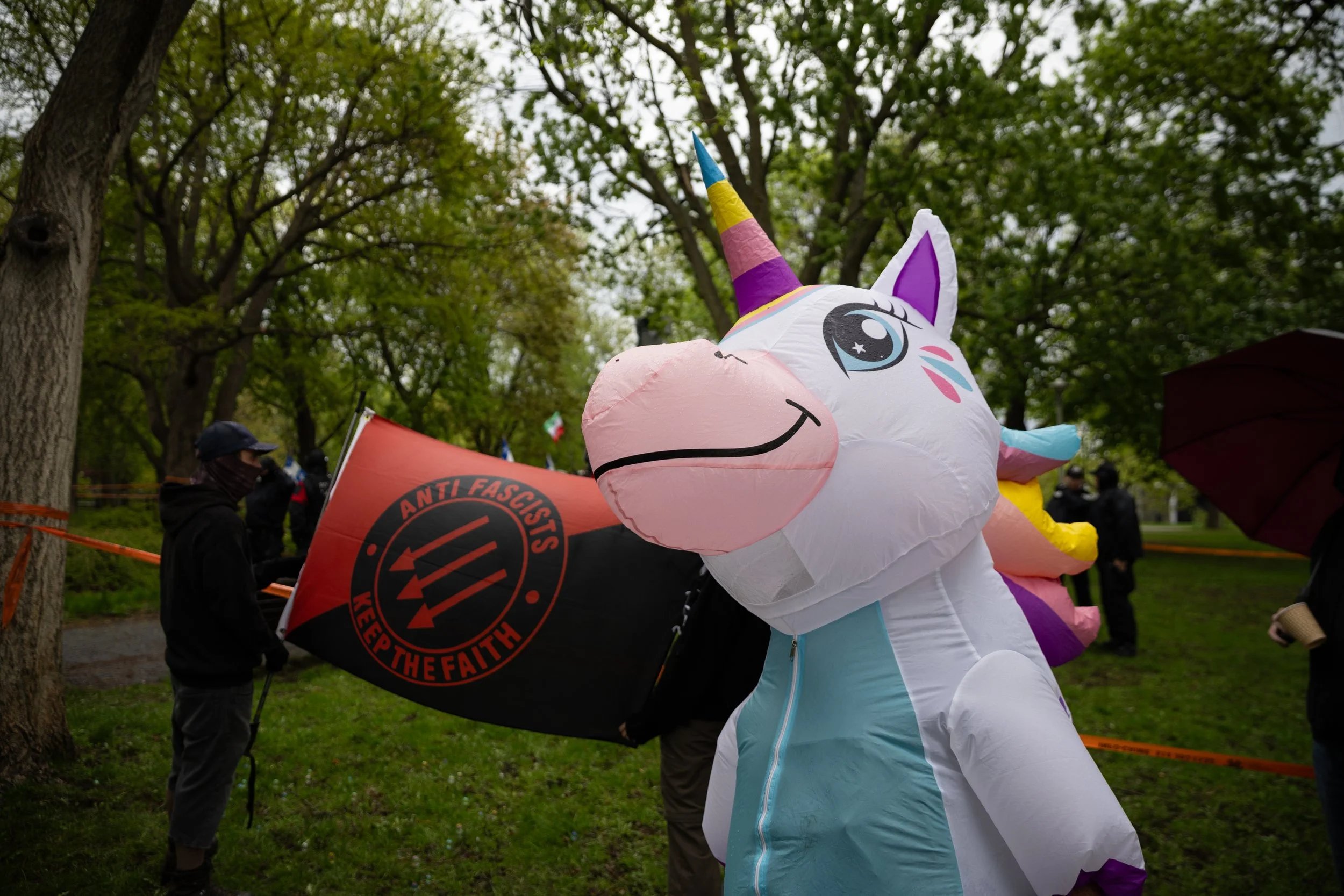  Antifascist activists protesting a Nouvelle Alliance rally in Parc La Fontaine. Plateau, Montreal. May 18, 2026.  