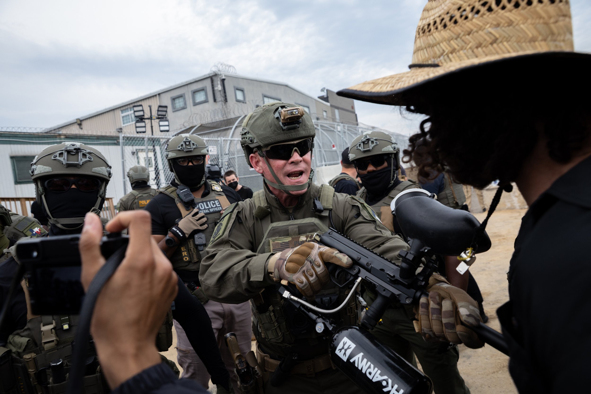  ICE agents push back demonstrators outside Delaney Hall Detention Center. Newark, New Jersey. June 6, 2026. William Wilson. 