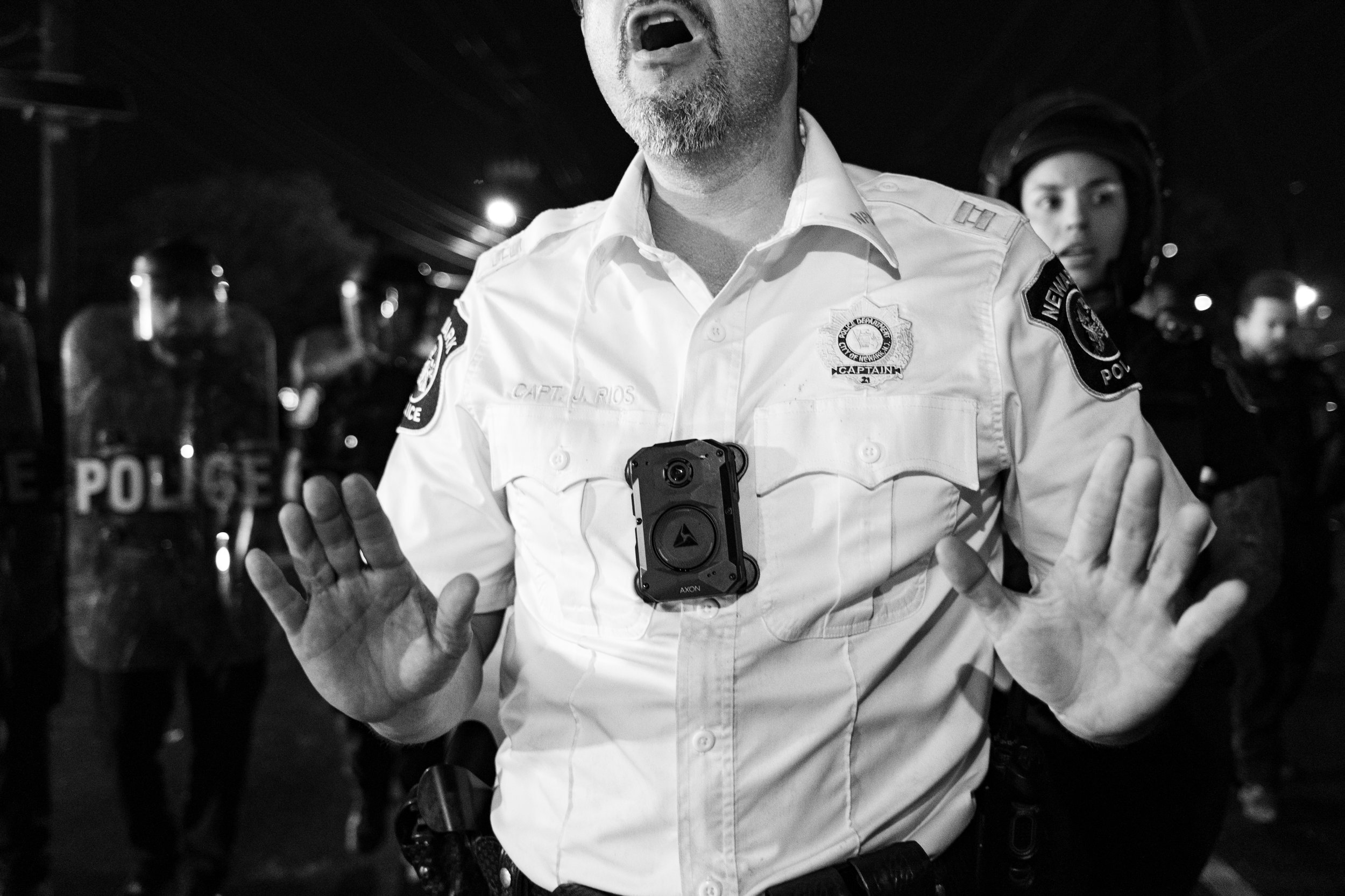  A Newark PD Captain announces the demonstration has been ruled illegal and orders its dispersal at a protest outside ICE’s Delaney Hall Detention Center. Newark, New Jersey. June 6, 2026. William Wilson.  