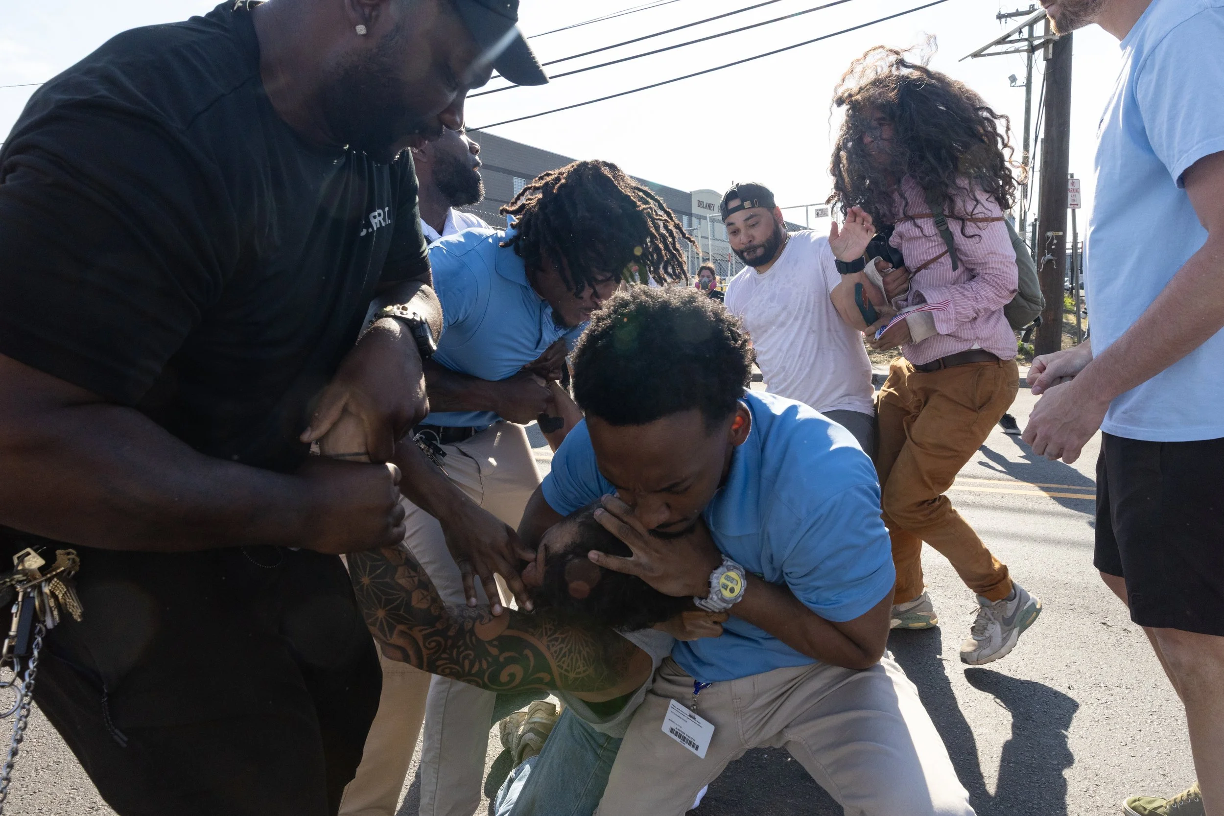  GEO Group employees brawl with demonstrators outside ICE’s Delaney Hall Detention Center. Newark, New Jersey. June 5, 2026. William Wilson.  