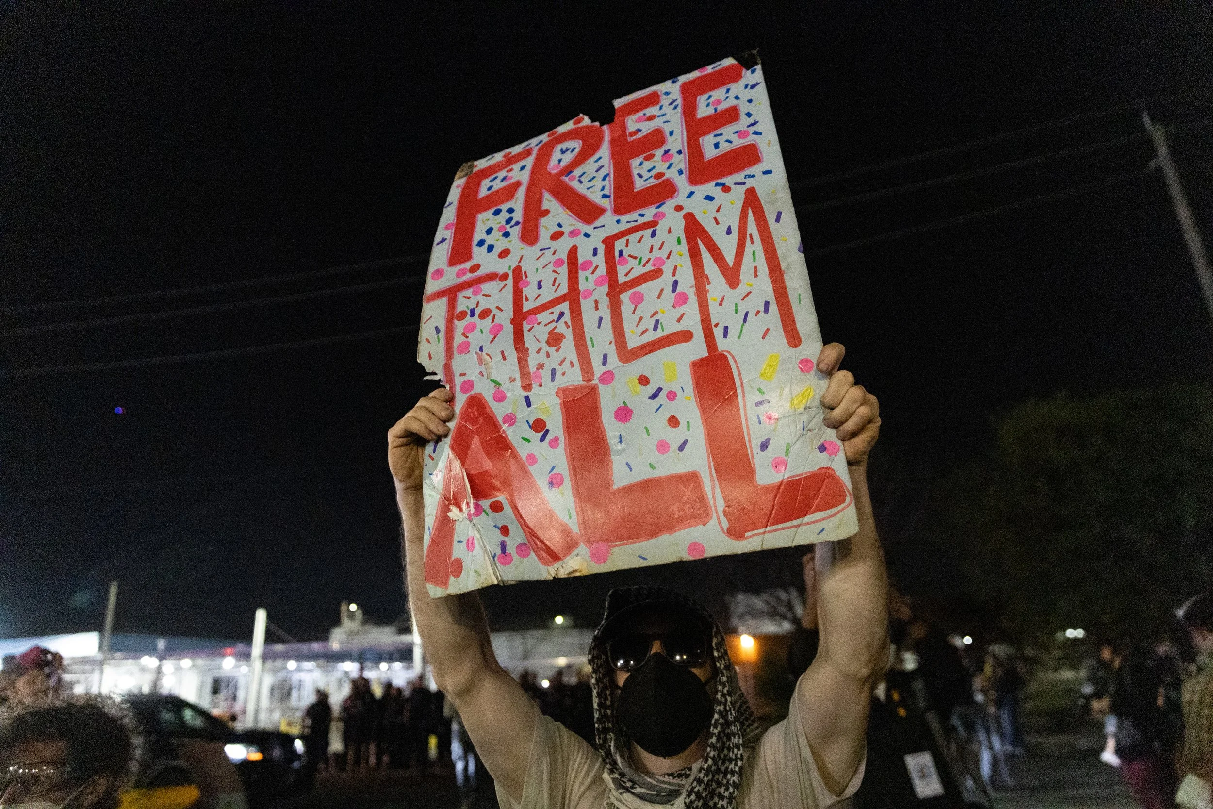  Protester holds a sign outside ICE’s Delaney Hall Detention Center. Newark, New Jersey. June 5, 2026. William Wilson.  