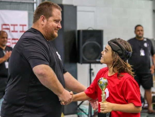 Newly appointed HSF Regional Director, Rico Ferrari, presenting the Golden Boot award to Big Island Futsal's Jack Jerimiah, for his top goal performance at the Austronesian Futsal Cup 17.