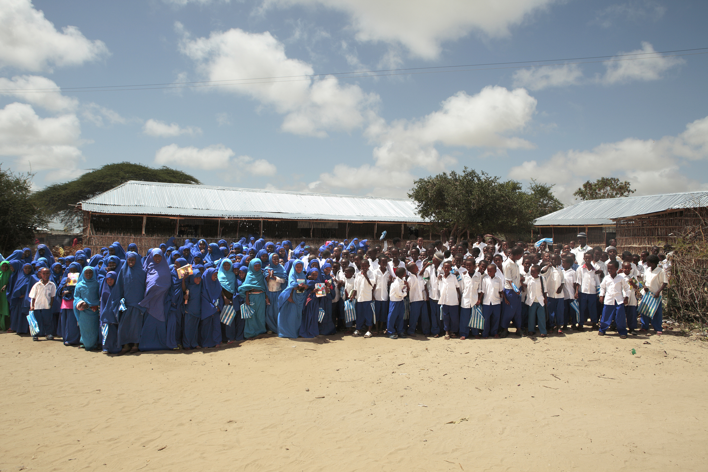   The students outside the RAJO school  