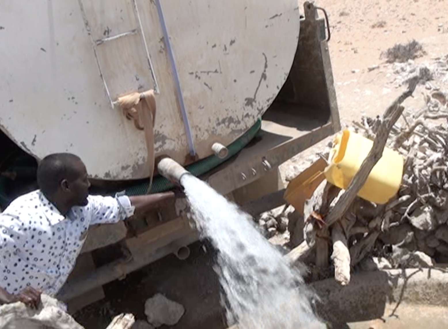 Water is put into the local village well