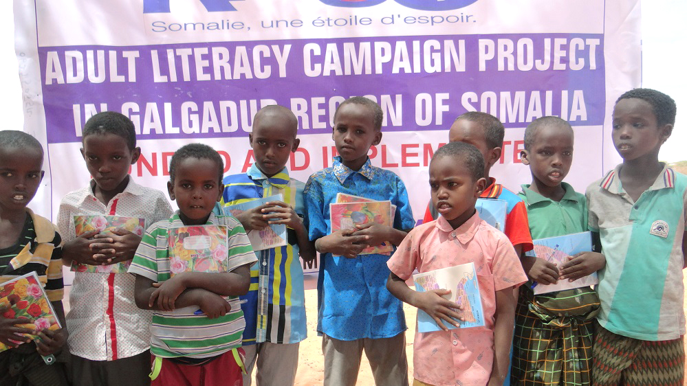   Young boys that have graduated from the literacy campaign project  