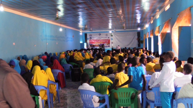   Workers from the cooperative visit schools and take student's measurements   