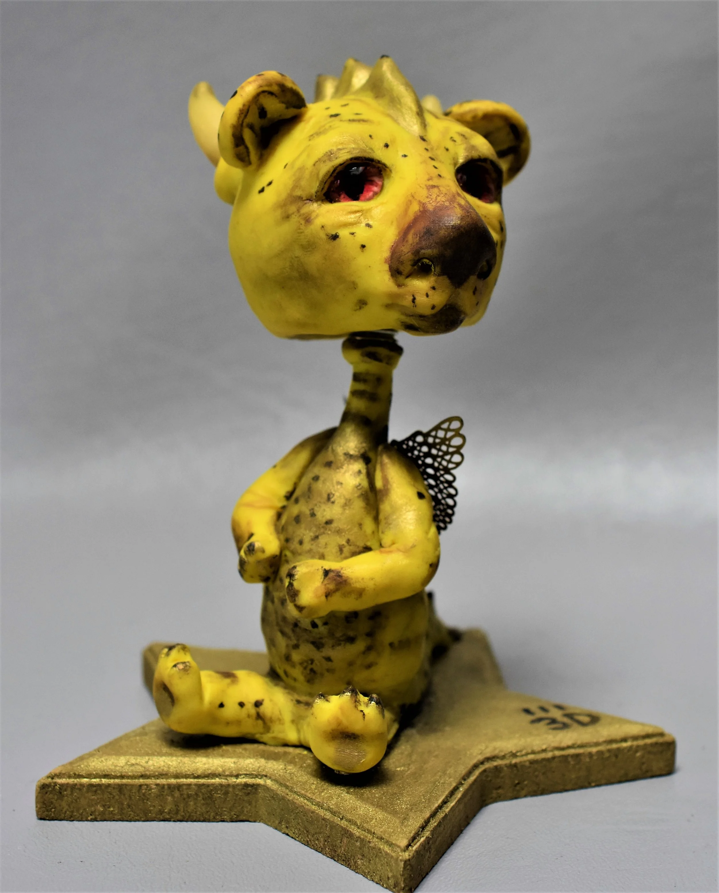 5.5” Old Yellow Booble Head Dragon $60.00