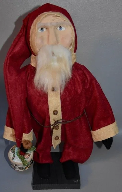 17” Vintage Style Blue-Eyed Santa Wearing Red Union suit Holding Box $88.00