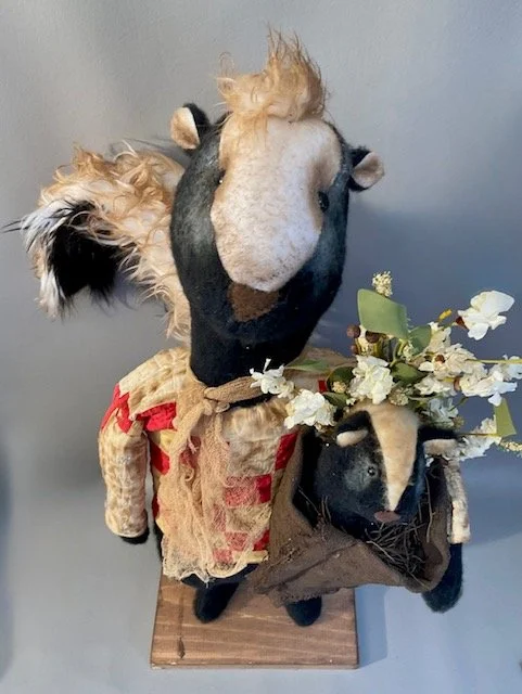 27” Skunk with baby $325.00