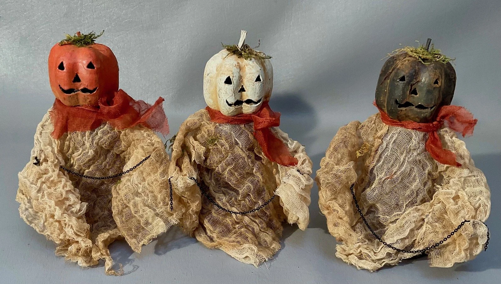 7.5” paper mache Pumpkin People $24.00