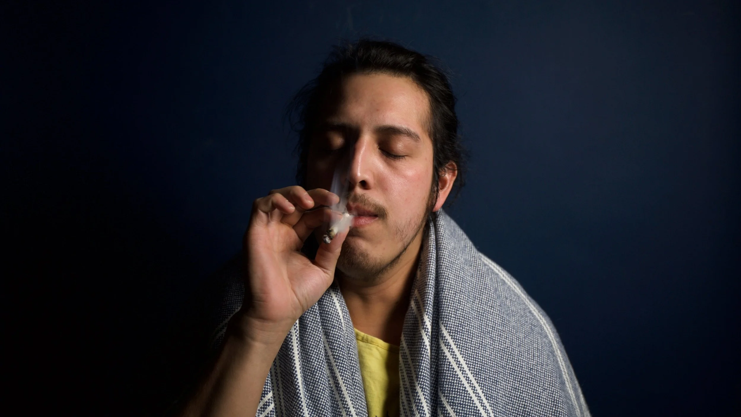cannabis-cigarette-facial-expression-395087.jpg