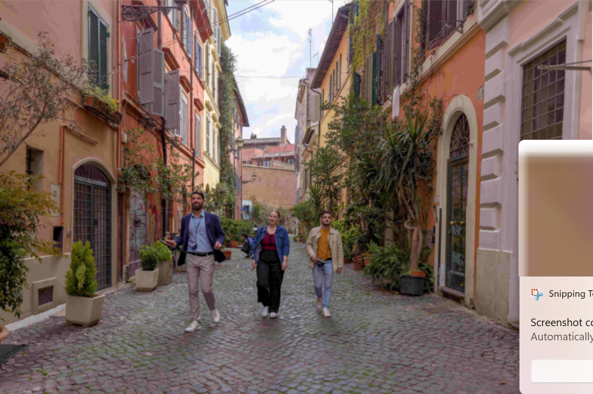 From above, Trastevere looks like a living mosaic of winding cobblestone streets, small piazzas, and centuries-old buildings packed tightly together
