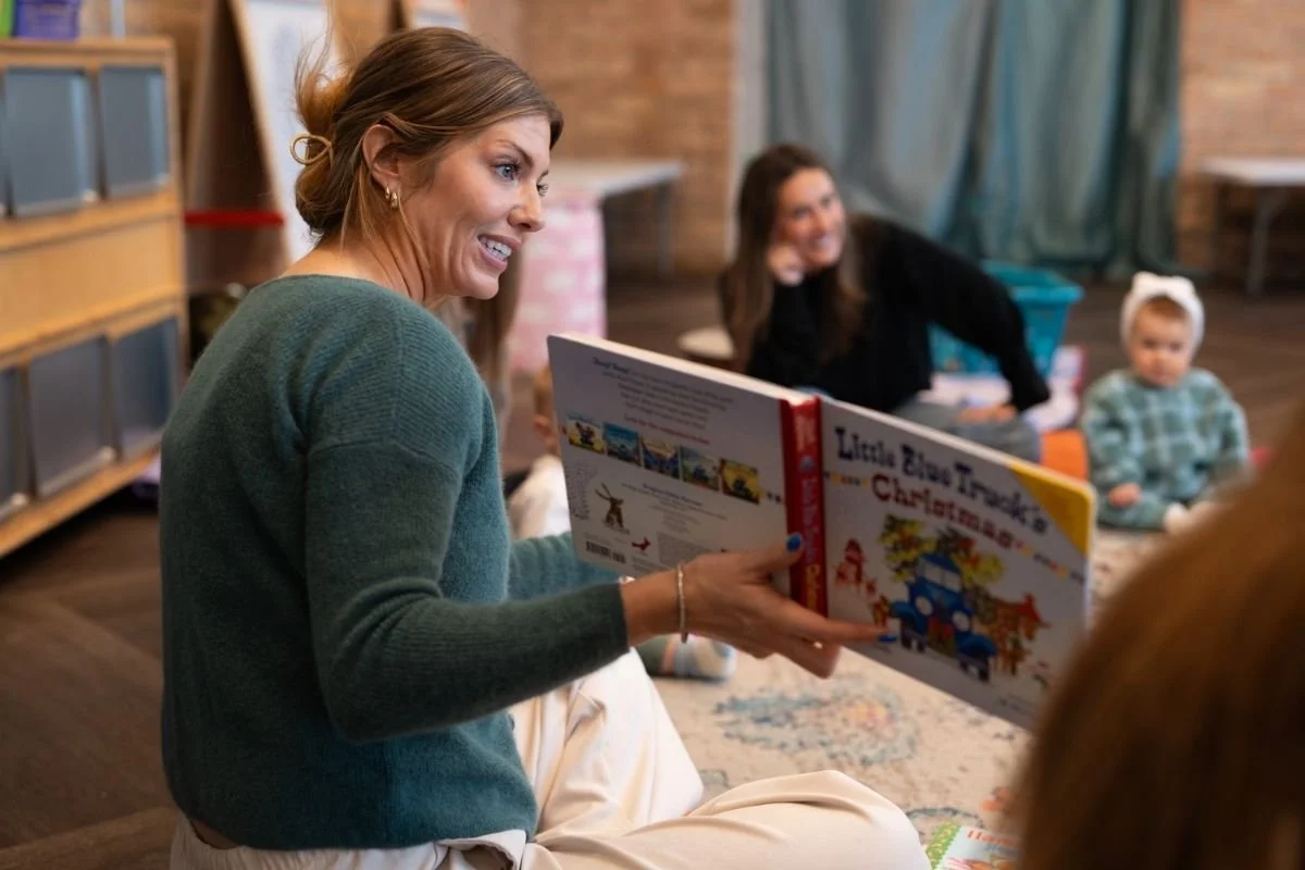 Miss Beth reading to young children and looking for reading readiness signs