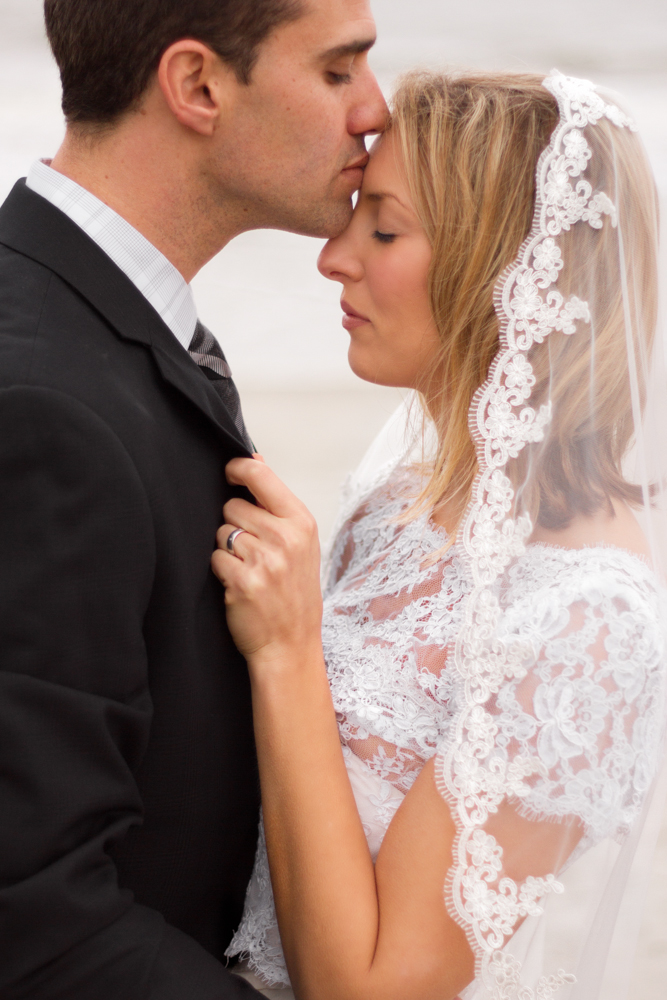 Husband-Kisses-Wife-Intimate-Wedding-Photography