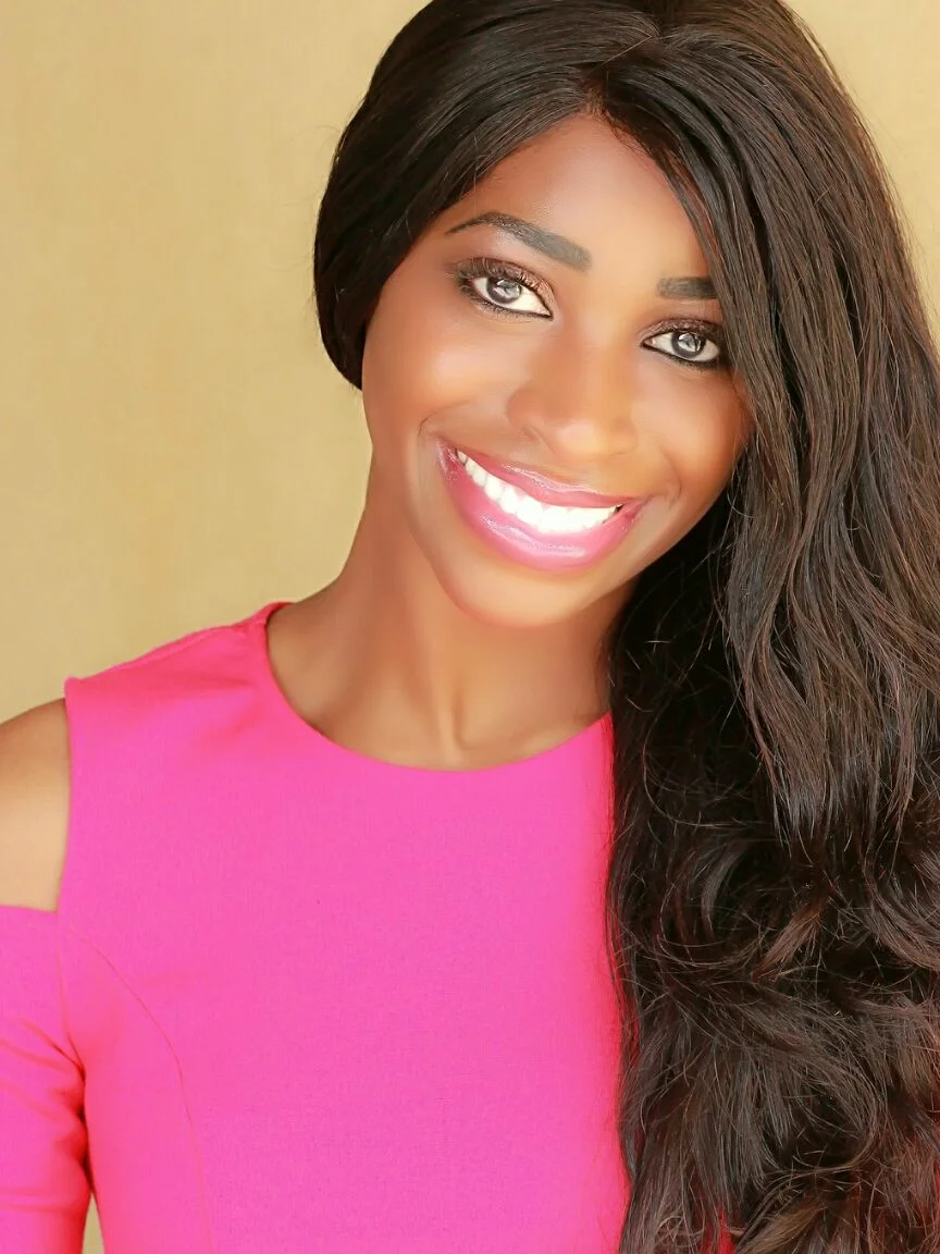 Egondu Brant - BEAUTY HEADSHOT in FUSCHIA.jpg