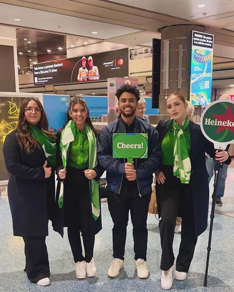 Guest services staff assisting attendees during a live event