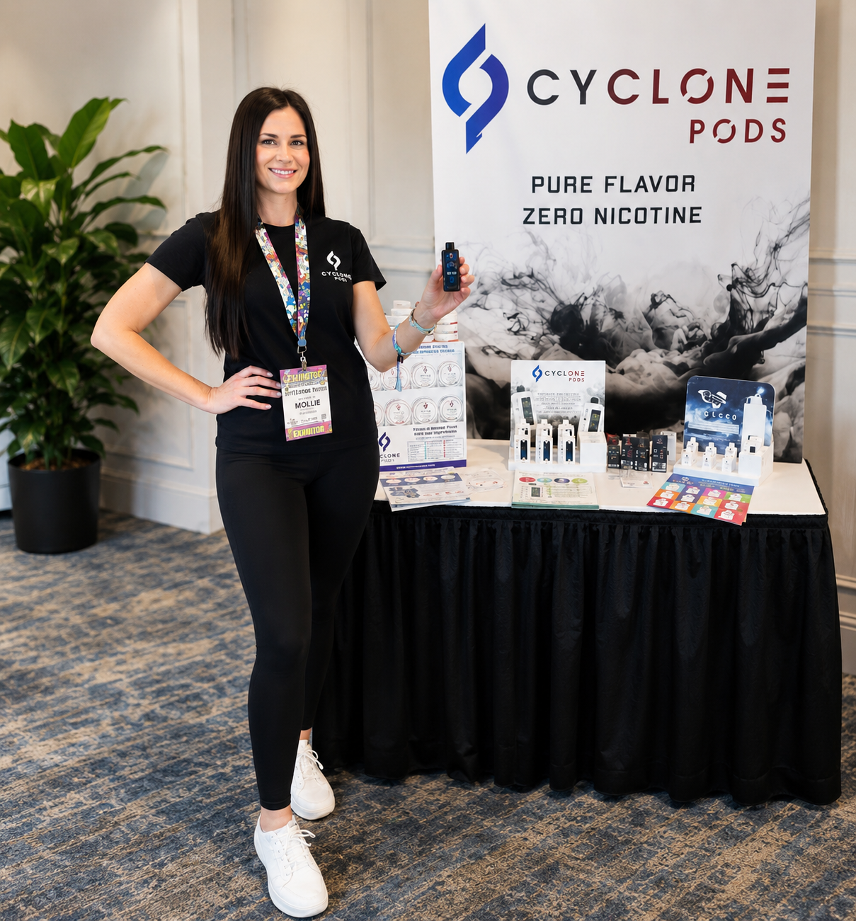 Professional brand ambassador representing an exhibitor at a trade show booth during a convention in Dallas, Texas.
