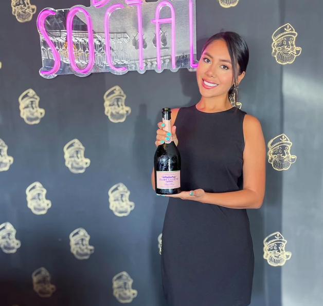 Beverage model during a brand activation in Tampa