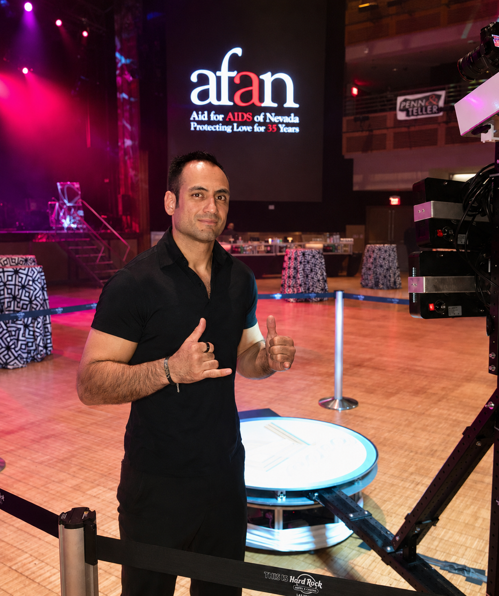 Polished Las Vegas production assistants managing logistics behind the scenes at a corporate expo footprint