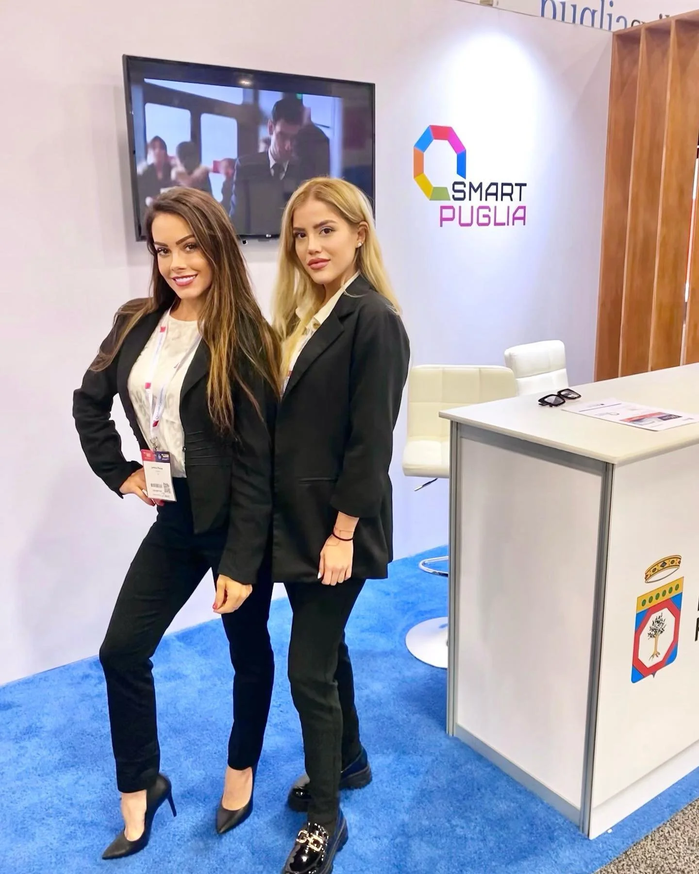 Miami trade show models representing a brand at a convention booth