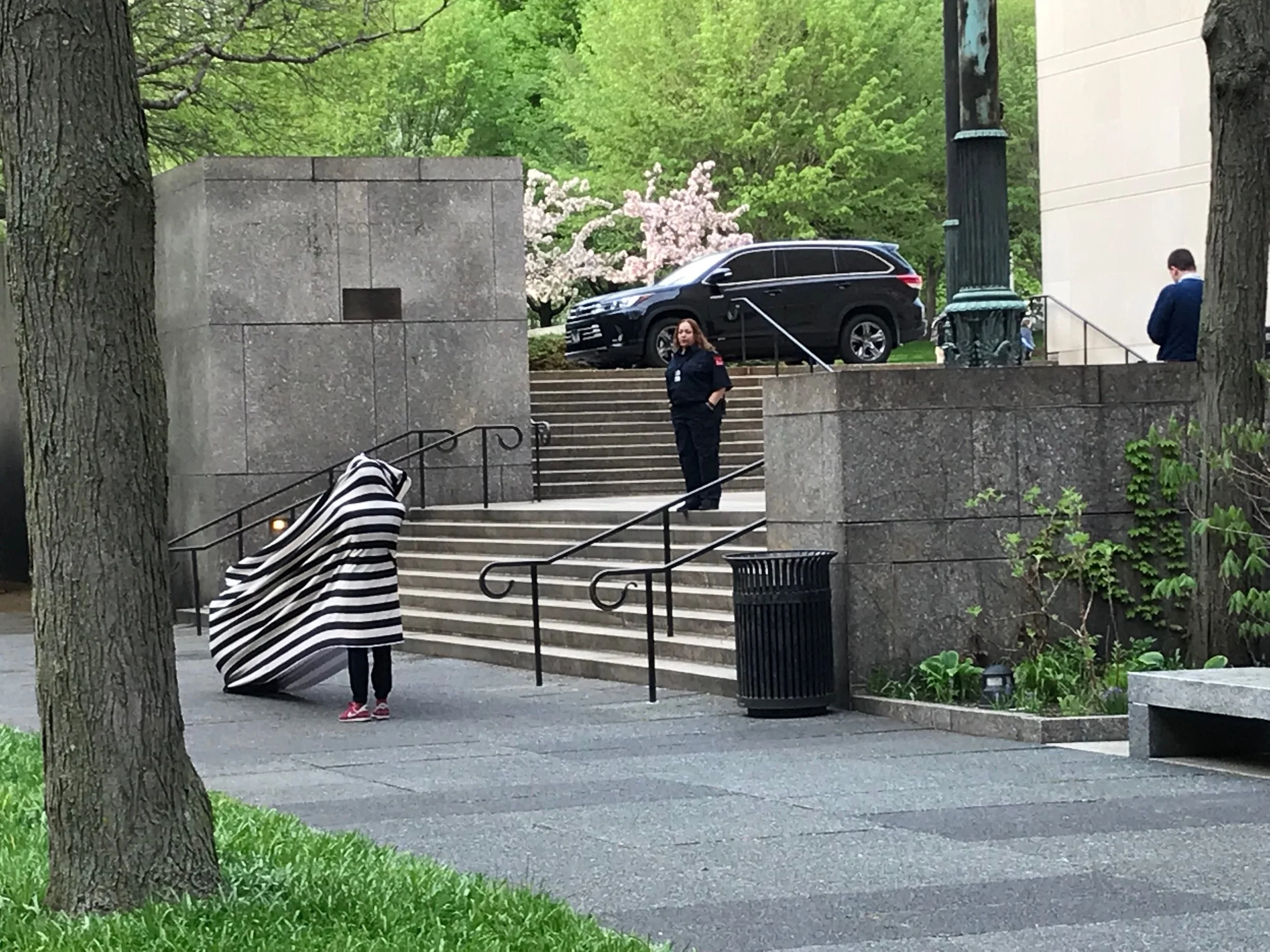 Here we are engaged in our Play conversation. This security guard at the top of the steps is telling us to stop. We explained to her that it was a part of a show associated with the Performance Art program at the school. She replied that she had her orders. How can a program that focuses on ephemera and topics of spontaneity exist in an institutional setting? Issues of liability of course are reasons, but we were not behaving in a dangerous manner.
