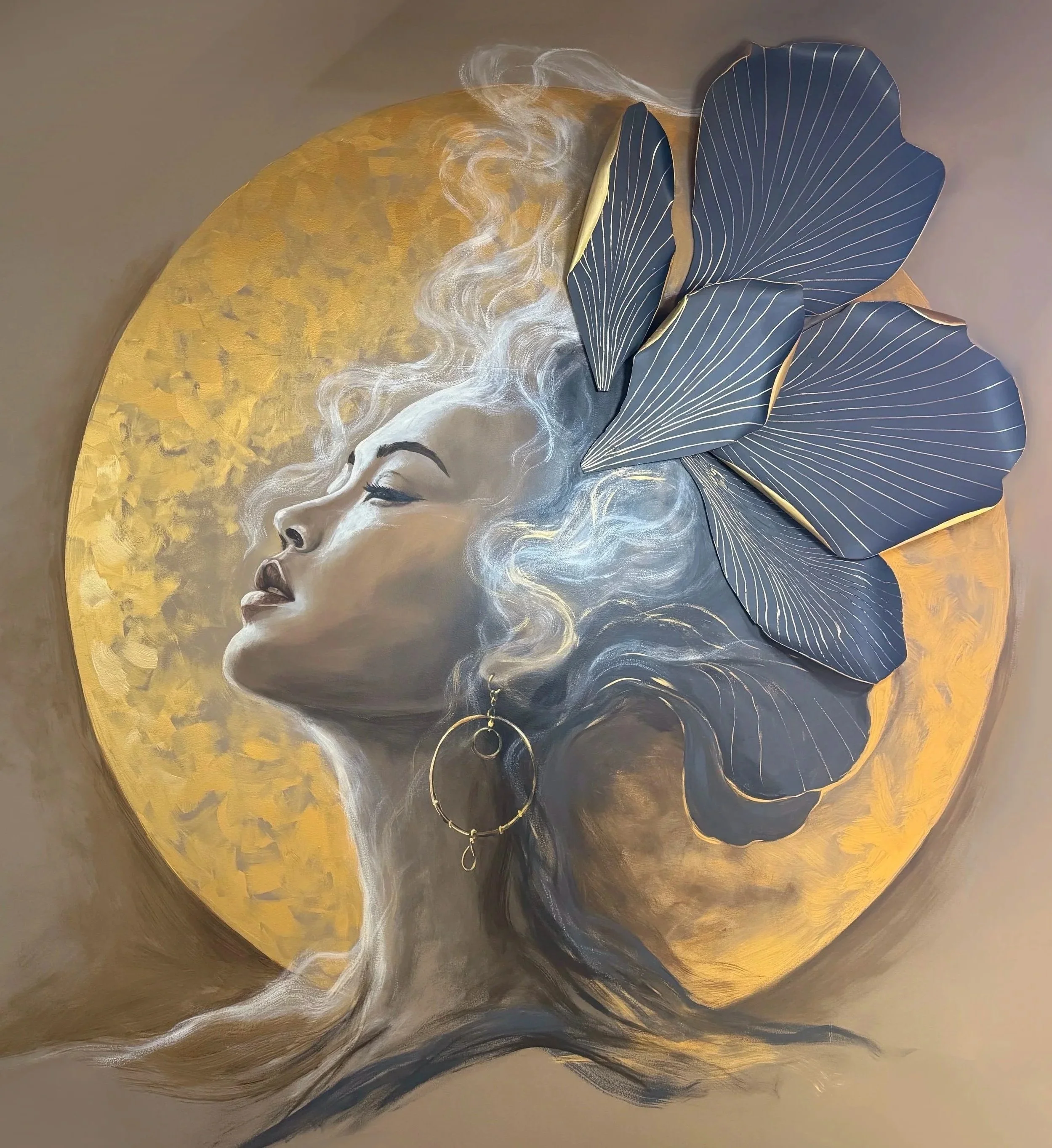 Dimensional portrait featuring hand-painted details and layered 3D sculptural elements.