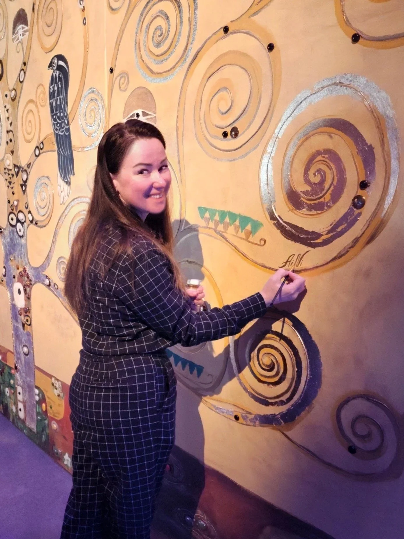 Anna Yakimenko hand-painting a Van Gogh inspired scenic backdrop for the Immersive Van Gogh exhibition in Boston.