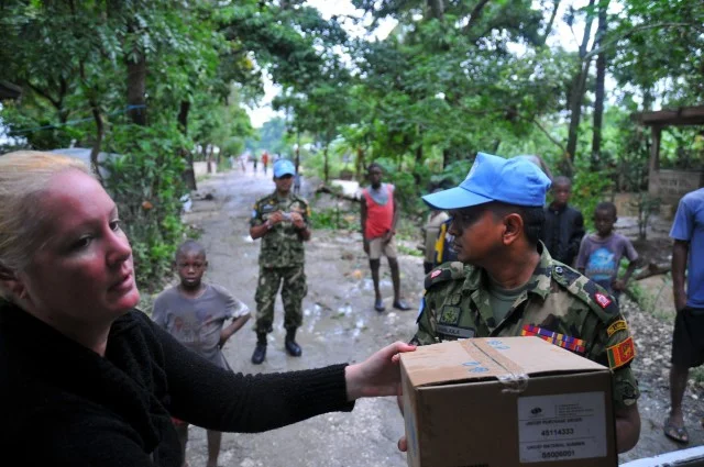 Jolinda, Sri Bat and UNICEF hygiene kits (by Chris Baird)