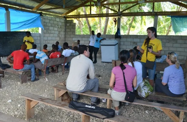 Sarah talks about our literacy class with a group of visitors.