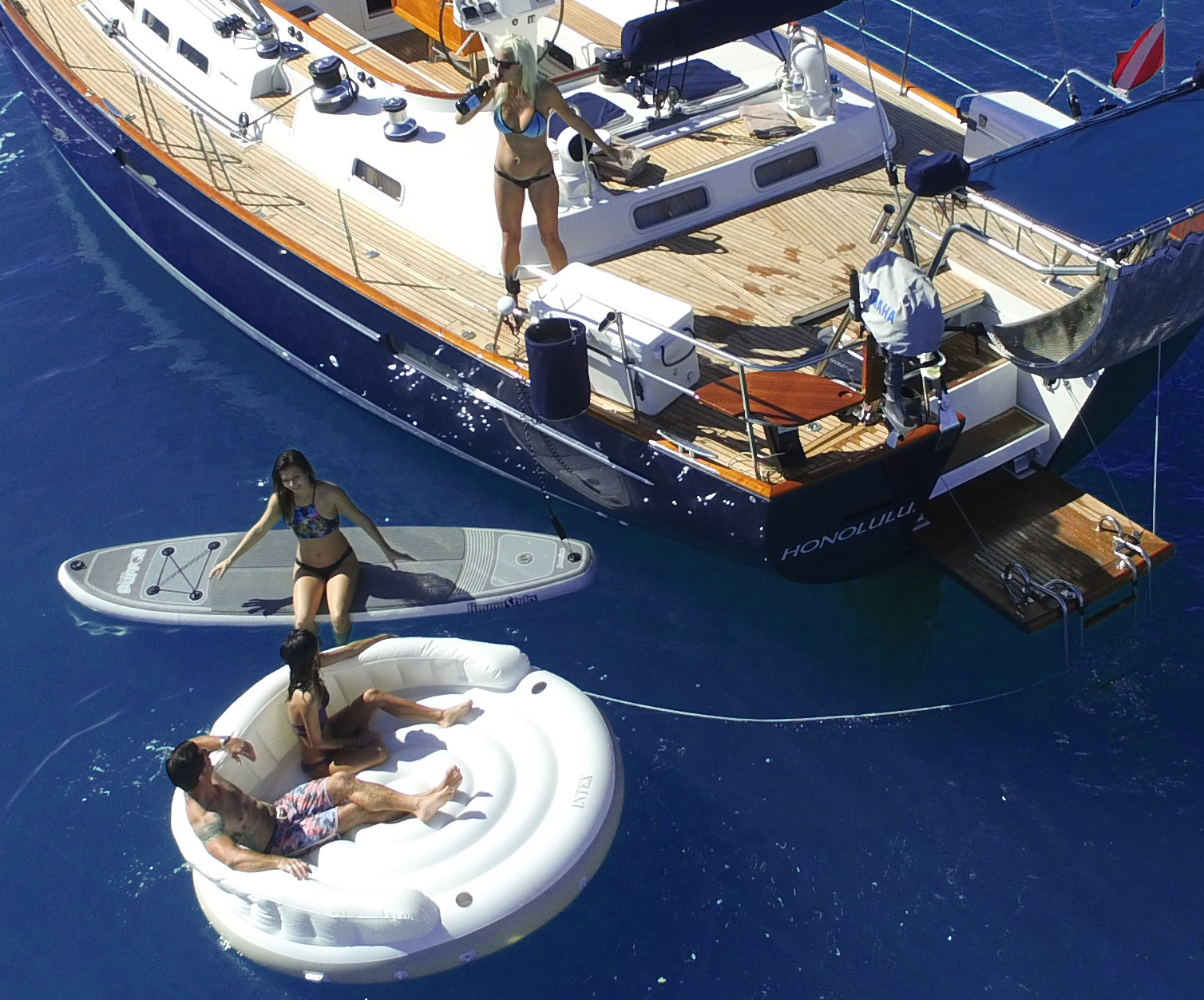 Snorkeling on yacht with SUP and lounge raft off waikiki