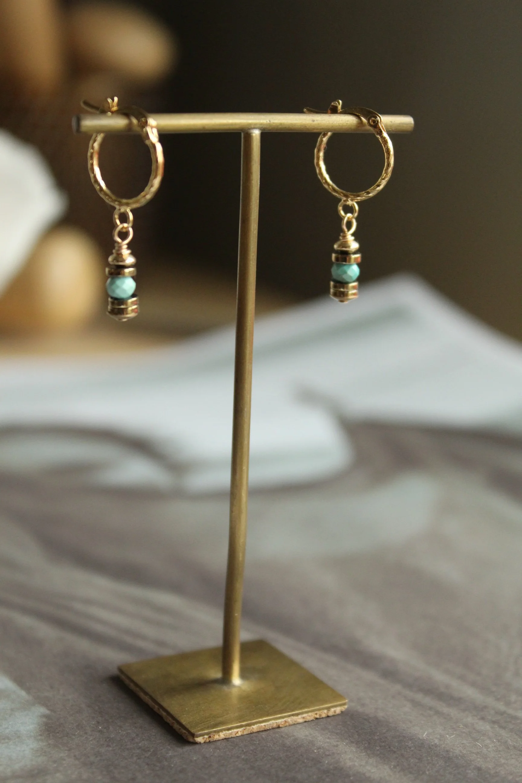 14ct gold filled mini lever back hoop with hematite and turquoise roundel drop.